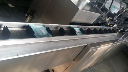 Feeding Product On Conveyor By Manual